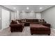 Large finished basement with gray walls, carpet, and a comfortable sectional at 2131 E New Bedford Dr, Gilbert, AZ 85234