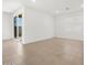 Bright living room features ceramic tile floor and large sliding glass door at 24493 W Grenadine Rd, Buckeye, AZ 85326