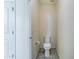 Small toilet room with tile flooring and a compact toilet at 25755 W Hazel Dr, Buckeye, AZ 85326