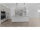 Beautiful kitchen featuring stainless steel appliances, a large island, granite countertops, and neutral-toned cabinets at 26079 S 228Th St, Queen Creek, AZ 85142