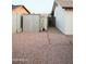 Backyard sheds with desert landscaping providing extra storage space at 2738 E Libby St, Phoenix, AZ 85032