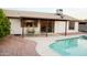 Inviting backyard featuring a refreshing swimming pool and covered patio area at 2738 E Libby St, Phoenix, AZ 85032