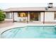 Inviting backyard featuring a refreshing swimming pool and covered patio area at 2738 E Libby St, Phoenix, AZ 85032