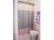The bathroom features a toilet and tub with shower at 2738 E Libby St, Phoenix, AZ 85032