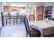 View of the dining area, which has a table and chairs near the kitchen at 2738 E Libby St, Phoenix, AZ 85032