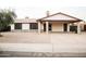 Charming single-story home with a spacious carport and low maintenance desert landscaping at 2738 E Libby St, Phoenix, AZ 85032
