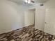 Empty bedroom featuring modern flooring, a closet, a ceiling fan, and neutral walls at 3330 S Gilbert Rd # 1003, Chandler, AZ 85286