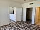 Bedroom featuring modern wood flooring, a closet, and neutral wall paint at 3330 S Gilbert Rd # 1003, Chandler, AZ 85286