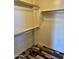 Walk-in closet with wood flooring and shelving at 3330 S Gilbert Rd # 1003, Chandler, AZ 85286