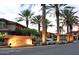 The Santana Ridge condominium complex entrance features lighted signage, mature landscaping, and access to the community at 3330 S Gilbert Rd # 1003, Chandler, AZ 85286