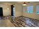 Inviting living area with neutral walls, mixed flooring and slider doors that provide seamless indoor-outdoor living experience at 3330 S Gilbert Rd # 1003, Chandler, AZ 85286