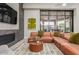 Community lounge area with TV, fireplace, and seating at 3330 S Gilbert Rd # 1003, Chandler, AZ 85286