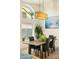 Bright dining room with stylish lighting, modern decor, and comfortable seating for Gathering meals at 3921 W Sheffield Ave, Chandler, AZ 85226