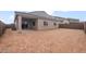 Expansive backyard with a covered patio, perfect for outdoor entertaining and relaxation at 4119 S 176Th Dr, Goodyear, AZ 85338
