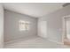 Empty bedroom with carpet and a window at 4119 S 176Th Dr, Goodyear, AZ 85338