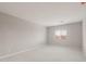 Spacious bedroom offering soft carpet, neutral walls, and a window for natural light at 4119 S 176Th Dr, Goodyear, AZ 85338