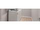 Conveniently located laundry room with modern, energy-efficient washer and dryer appliances at 4119 S 176Th Dr, Goodyear, AZ 85338
