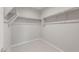 Walk-in closet featuring shelving for clothing storage at 4119 S 176Th Dr, Goodyear, AZ 85338