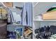 Walk-in closet providing ample space for storage and organization of clothing and personal items at 4208 E Windsor Ave, Phoenix, AZ 85008