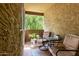 Cozy balcony with seating, providing a private outdoor retreat with potted plants and room for outdoor enjoyment at 461 W Holmes Ave # 224, Mesa, AZ 85210
