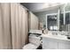 Bathroom with neutral colors, standard shower and toilet at 461 W Holmes Ave # 224, Mesa, AZ 85210