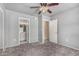 The bedroom features gray walls, carpeted flooring, and access to the bathroom at 461 W Holmes Ave # 224, Mesa, AZ 85210