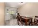 The dining room is next to sliding doors to the outside and a Keurig coffee maker at 461 W Holmes Ave # 224, Mesa, AZ 85210