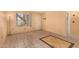 Living room showcasing tile flooring, and a large window providing natural light at 461 W Holmes Ave # 224, Mesa, AZ 85210