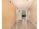 Living room showcasing tile flooring and sliding glass doors leading outside at 461 W Holmes Ave # 224, Mesa, AZ 85210