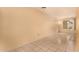 Living room showcasing tile flooring, and a large window providing natural light at 461 W Holmes Ave # 224, Mesa, AZ 85210
