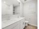 A bright bathroom with double vanity, modern fixtures, and a window creating a clean and stylish space at 4813 N 177Th Ln, Goodyear, AZ 85395