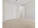 Neutral bedroom offering a closet and a doorway, providing a functional space for a comfortable living at 4813 N 177Th Ln, Goodyear, AZ 85395