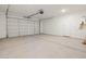 Spacious two-car garage with high ceilings and a water heater at 4813 N 177Th Ln, Goodyear, AZ 85395