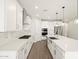 Gourmet kitchen featuring stainless steel appliances, stone countertops, and subway tile backsplash at 4813 N 177Th Ln, Goodyear, AZ 85395