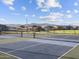 Community pickleball courts with mountain views, blue and green surfaces, and black fencing at 4813 N 177Th Ln, Goodyear, AZ 85395