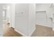 Open walk-in closet with wood look flooring, creating a functional space at 4813 N 177Th Ln, Goodyear, AZ 85395