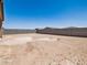 The backyard features a blank canvas with a block fence and desert landscaping potential at 4819 N 177Th Ln, Goodyear, AZ 85395
