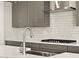 Close-up of a modern kitchen with grey cabinets, stainless steel appliances, and stylish fixtures at 4819 N 177Th Ln, Goodyear, AZ 85395