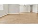 Expansive living area with modern lighting and plank flooring at 4819 N 177Th Ln, Goodyear, AZ 85395