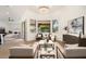 Spacious living room offering ample seating, with lots of natural light, and an open layout at 665 W Beechnut Dr, Chandler, AZ 85248