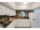 Bright kitchen featuring a peninsula, plenty of cabinet space and easy access to dining area at 811 E Seldon Ln, Phoenix, AZ 85020