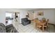 Open concept living space with tile floors, and easy access to the kitchen and dining room at 811 E Seldon Ln, Phoenix, AZ 85020