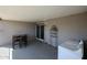 Covered patio with laundry hookups and dining set at 811 E Seldon Ln, Phoenix, AZ 85020