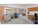 Inviting living room with ample seating and a sliding glass door to the outdoor space at 8315 E Lobo Ave, Mesa, AZ 85209