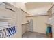 Organized walk-in closet with built-in shelving and ample storage space at 851 N Citrus Cove --, Mesa, AZ 85213
