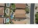 Overhead aerial showing landscaped backyard with pool, hot tub and adjacent home at 9733 W Hedge Hog Pl, Peoria, AZ 85383