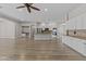 Spacious open-concept kitchen featuring stainless steel appliances, a center island, and ample cabinet space at 9733 W Hedge Hog Pl, Peoria, AZ 85383