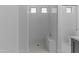 Bright walk-in shower featuring a built-in bench and white subway tile at 9733 W Hedge Hog Pl, Peoria, AZ 85383