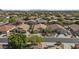 Street view of several homes, well-maintained landscaping and community at 9733 W Hedge Hog Pl, Peoria, AZ 85383