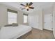 Bedroom with a ceiling fan, a bed, and a closet at 10749 E Nido Ave, Mesa, AZ 85209